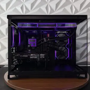DKBPC Core PC custom gaming desktop with Intel Core i7-9700K, MSI GeForce RTX 3060 Ti, purple RGB lighting, and tempered glass side panel.
