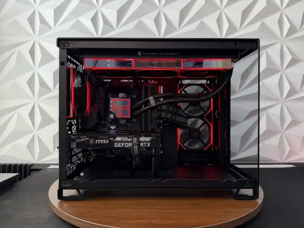 DKBPC Core PC gaming computer with red RGB lighting, MSI GeForce RTX 3060 Ti graphics card, and clean custom cable management.