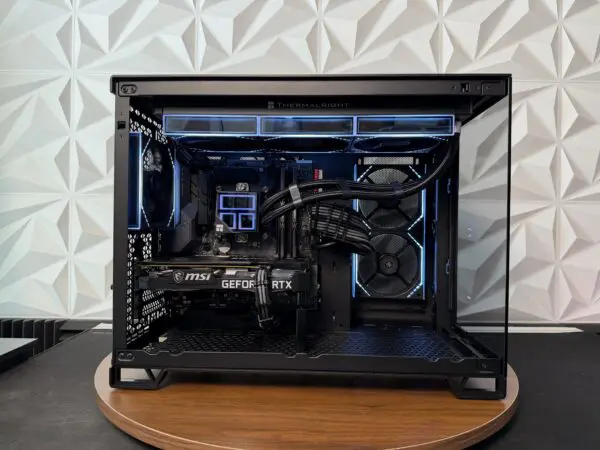 DKBPC Core PC featuring an Intel Core i7-9700K, MSI GeForce RTX 3060 Ti, blue RGB lighting, and premium custom-built interior.