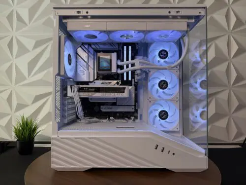 DKBPC Signature PC featuring AMD Ryzen 7 7800X3D and NVIDIA GeForce RTX 5060 in a white Lian Li Vector V1000X case