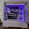 Front angled view of the DKBPC Signature PC with RGB lighting and white Lian Li Vector V1000X case